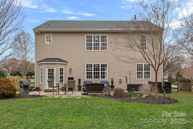 rear view of property with a patio, cooling unit, an outdoor hangout area, fence, and a lawn