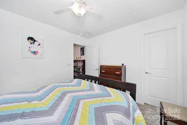 bedroom featuring carpet and a ceiling fan