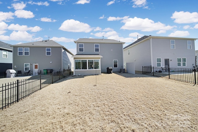 rear view of property with fence and central AC unit