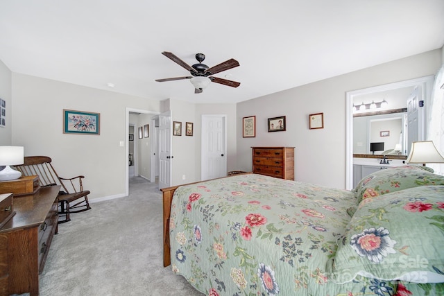 bedroom with light carpet, ceiling fan, and baseboards