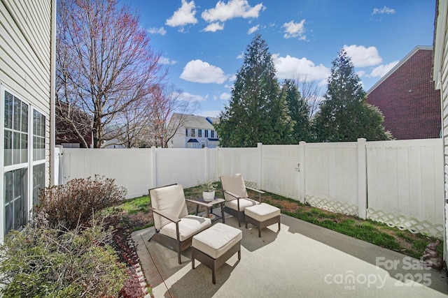 view of patio featuring a fenced backyard