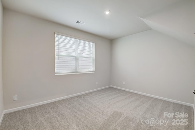2656 Tillman St, Monroe, NC 28112 - carpeted spare room with baseboards and lofted ceiling