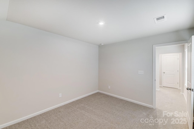 2656 Tillman St, Monroe, NC 28112 - unfurnished room featuring light carpet, baseboards, and recessed lighting