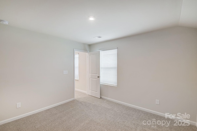 2656 Tillman St, Monroe, NC 28112 - unfurnished room featuring baseboards, light carpet, and a smoke detector