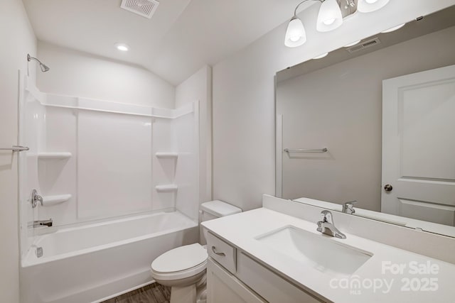 2656 Tillman St, Monroe, NC 28112 - bathroom with toilet, vanity, washtub / shower combination, and wood finished floors