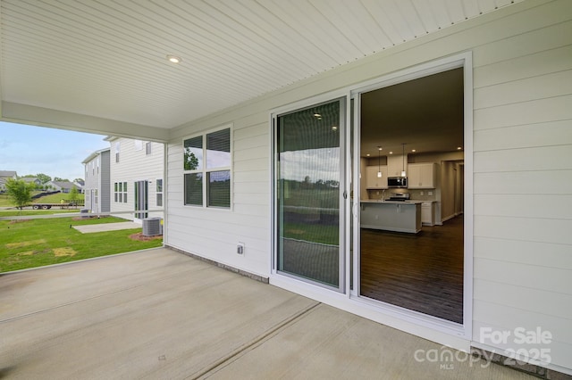 2656 Tillman St, Monroe, NC 28112 - view of patio / terrace featuring central AC