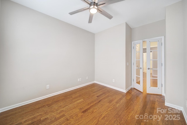 unfurnished room with ceiling fan, french doors, baseboards, and wood finished floors