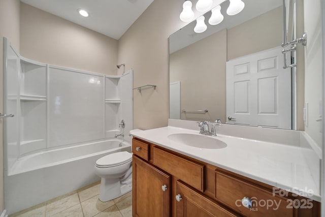 full bathroom featuring tile patterned floors, vanity, toilet, and shower / bathtub combination