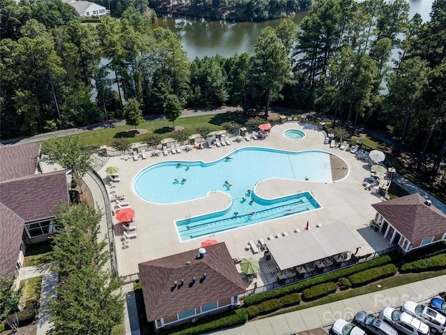 view of pool with a water view