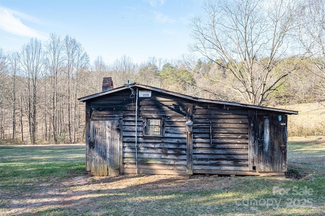 view of outdoor structure featuring an outbuilding