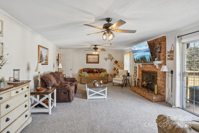 living room with a brick fireplace, a textured ceiling, crown molding, and carpet flooring