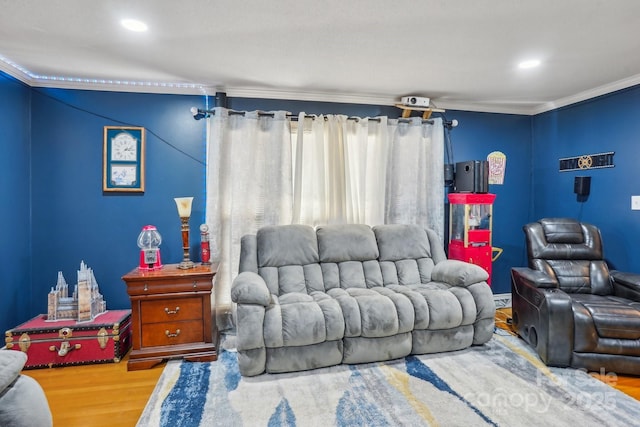 living area featuring recessed lighting, wood finished floors, and crown molding