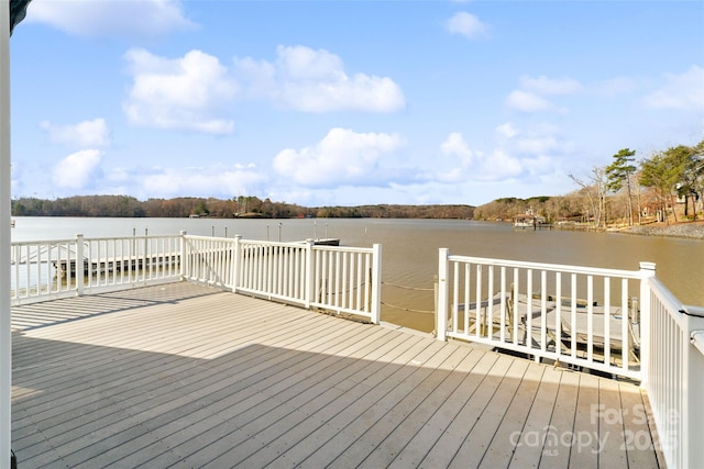 dock area with a deck with water view