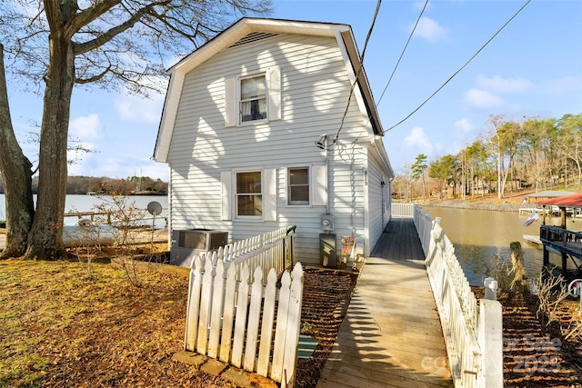 view of front of house featuring a water view