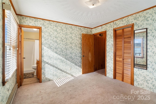 unfurnished room featuring a baseboard radiator, light carpet, crown molding, and wallpapered walls