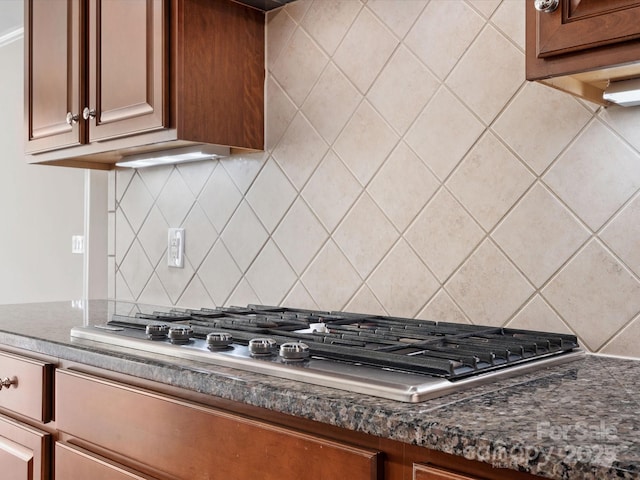 kitchen featuring tasteful backsplash and stainless steel gas stovetop