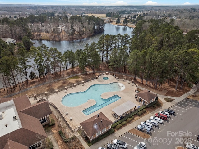 birds eye view of property featuring a water view