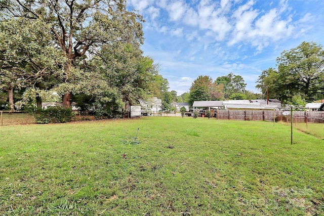 view of yard with fence