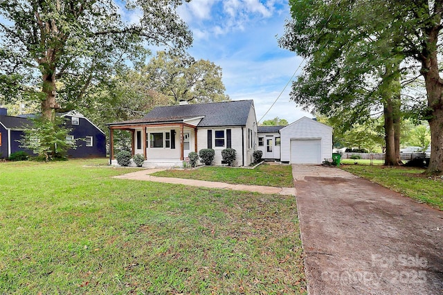 bungalow-style house with driveway, covered porch, fence, a front yard, and brick siding