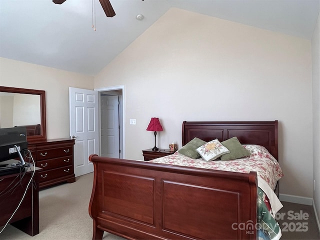 bedroom featuring light carpet, high vaulted ceiling, and a ceiling fan