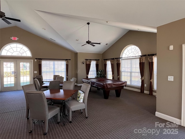 rec room with a wealth of natural light, french doors, carpet flooring, and vaulted ceiling