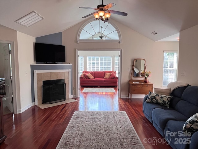 5518 Prosperity View Dr, Charlotte, NC 28269 - living room with lofted ceiling, wood finished floors, visible vents, and a ceiling fan