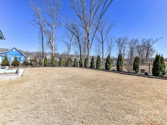 view of yard featuring fence