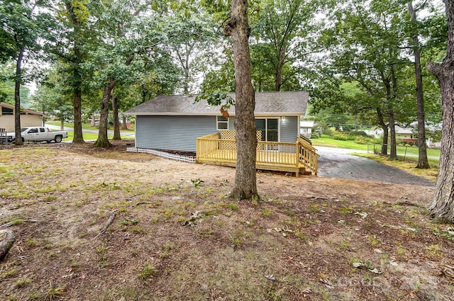 exterior space with a wooden deck