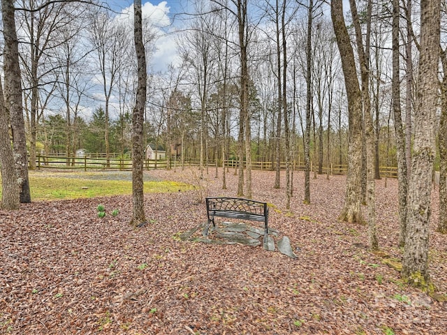 view of property's community with fence