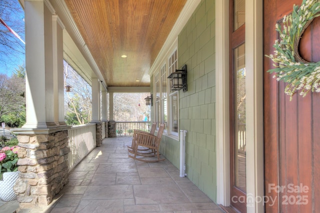 view of patio featuring covered porch