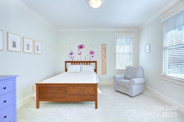 bedroom with crown molding, baseboards, and light colored carpet