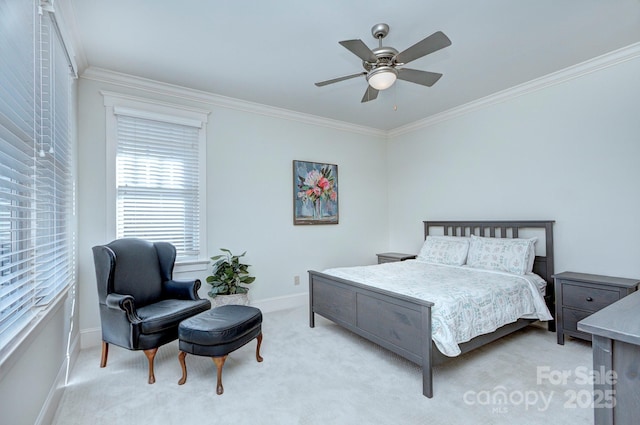 bedroom with ornamental molding, light carpet, baseboards, and a ceiling fan