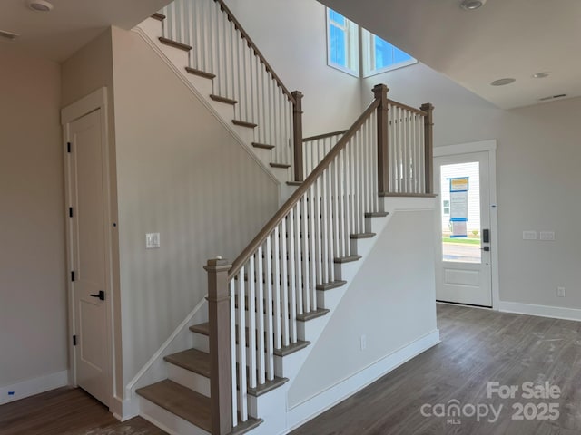 7459 Fighting Creek Rd Unit 33, Sherrills Ford, NC 28673 - staircase featuring wood finished floors and plenty of natural light