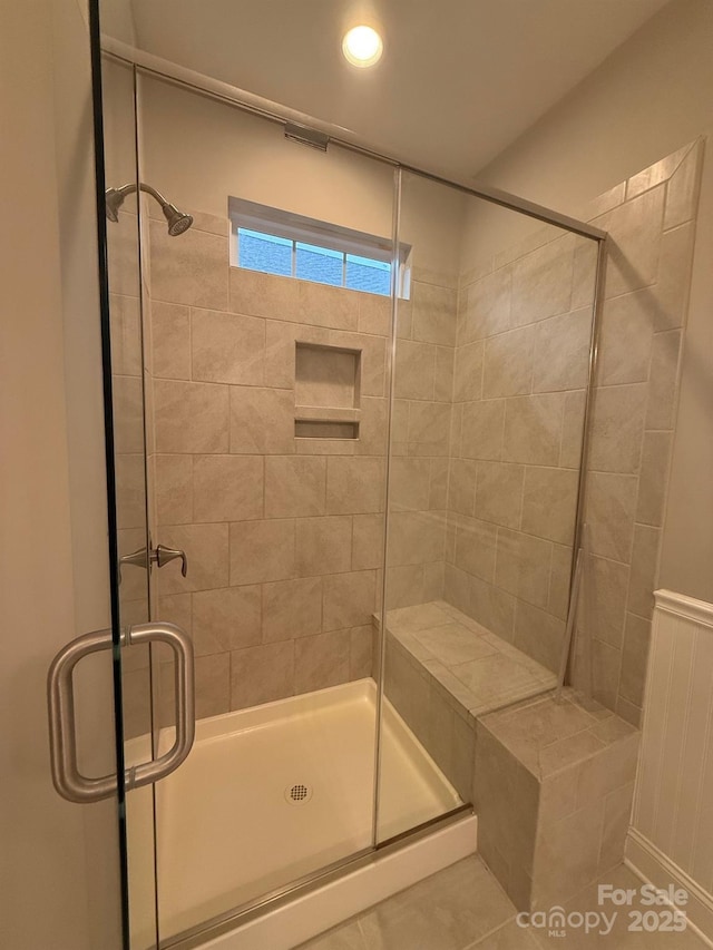 bathroom with a stall shower