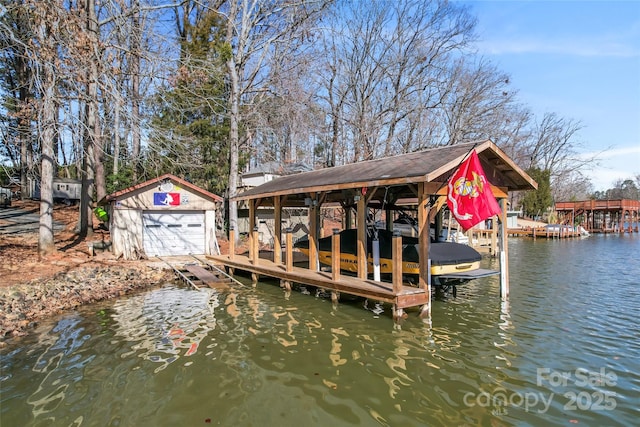 dock area with a water view and boat lift