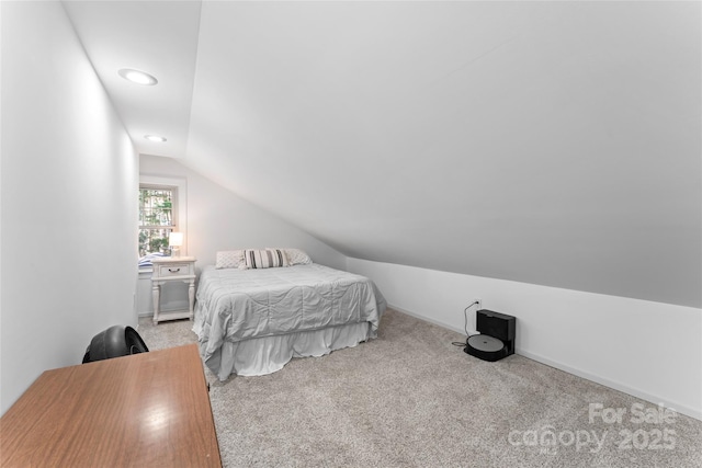 carpeted bedroom with lofted ceiling, baseboards, and recessed lighting