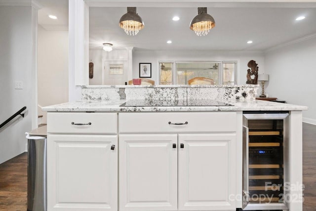 bar with black electric cooktop, recessed lighting, beverage cooler, dark wood-style floors, and crown molding