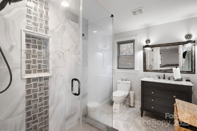 full bathroom featuring toilet, vanity, a shower stall, and visible vents