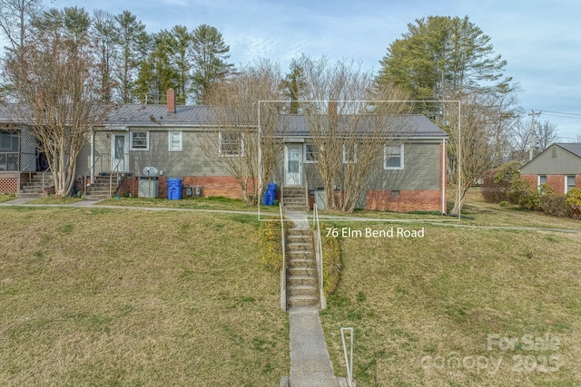 single story home with entry steps, crawl space, a chimney, and a front yard