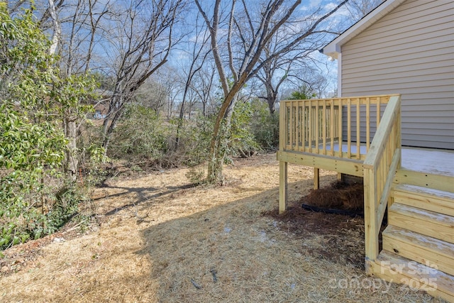 view of yard with a wooden deck