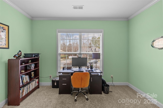 carpeted home office with crown molding, visible vents, and baseboards