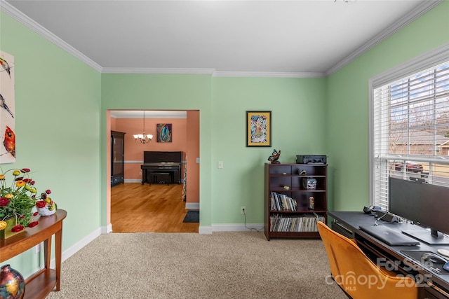 carpeted office featuring ornamental molding, an inviting chandelier, and baseboards