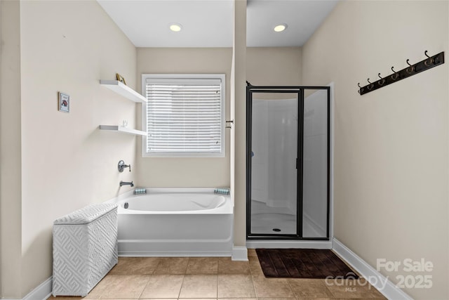 full bathroom with tile patterned flooring, recessed lighting, baseboards, a bath, and a stall shower