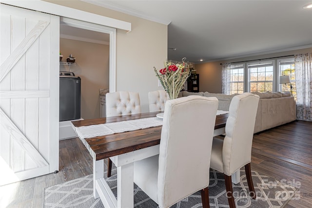 dining space featuring washer / clothes dryer, dark wood-type flooring, crown molding, and recessed lighting