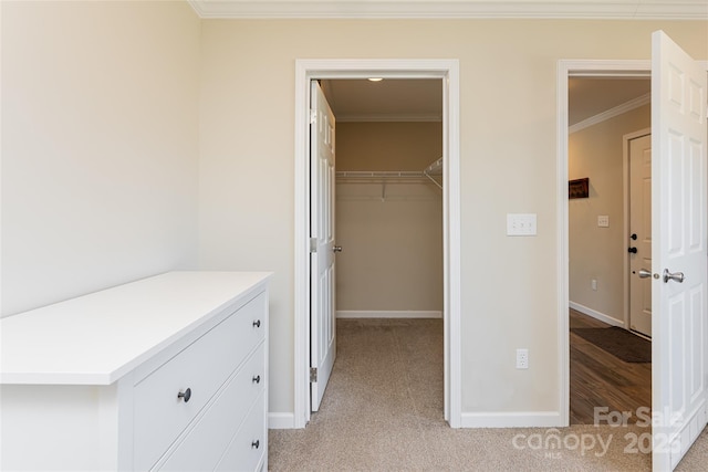 spacious closet with light colored carpet