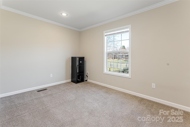 empty room featuring baseboards, visible vents, crown molding, carpet flooring, and recessed lighting