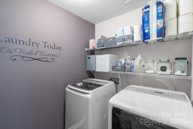 washroom with laundry area and independent washer and dryer