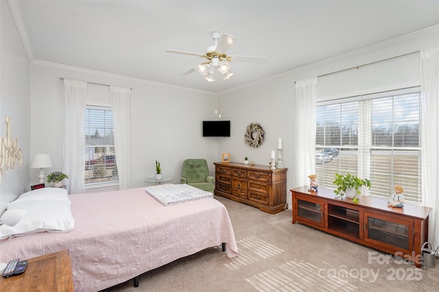 bedroom with light carpet, a ceiling fan, and crown molding