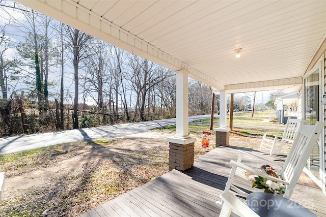 wooden deck featuring a porch