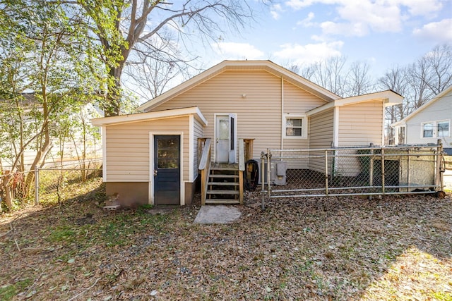 back of property with fence